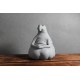 Plaster sculpture of piggy bank, waiting for the waiter to play